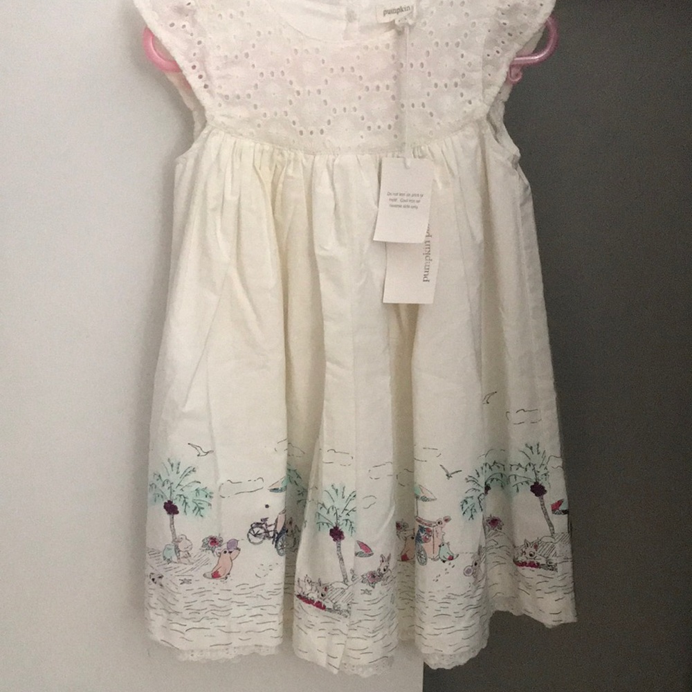 New with tags pumpkin patch dress 12-18 months.